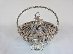 SWAN TOP LID WOVEN SILVER PLATED BASKET WITH LIGHT BLUE GLASS LINER BY unknown